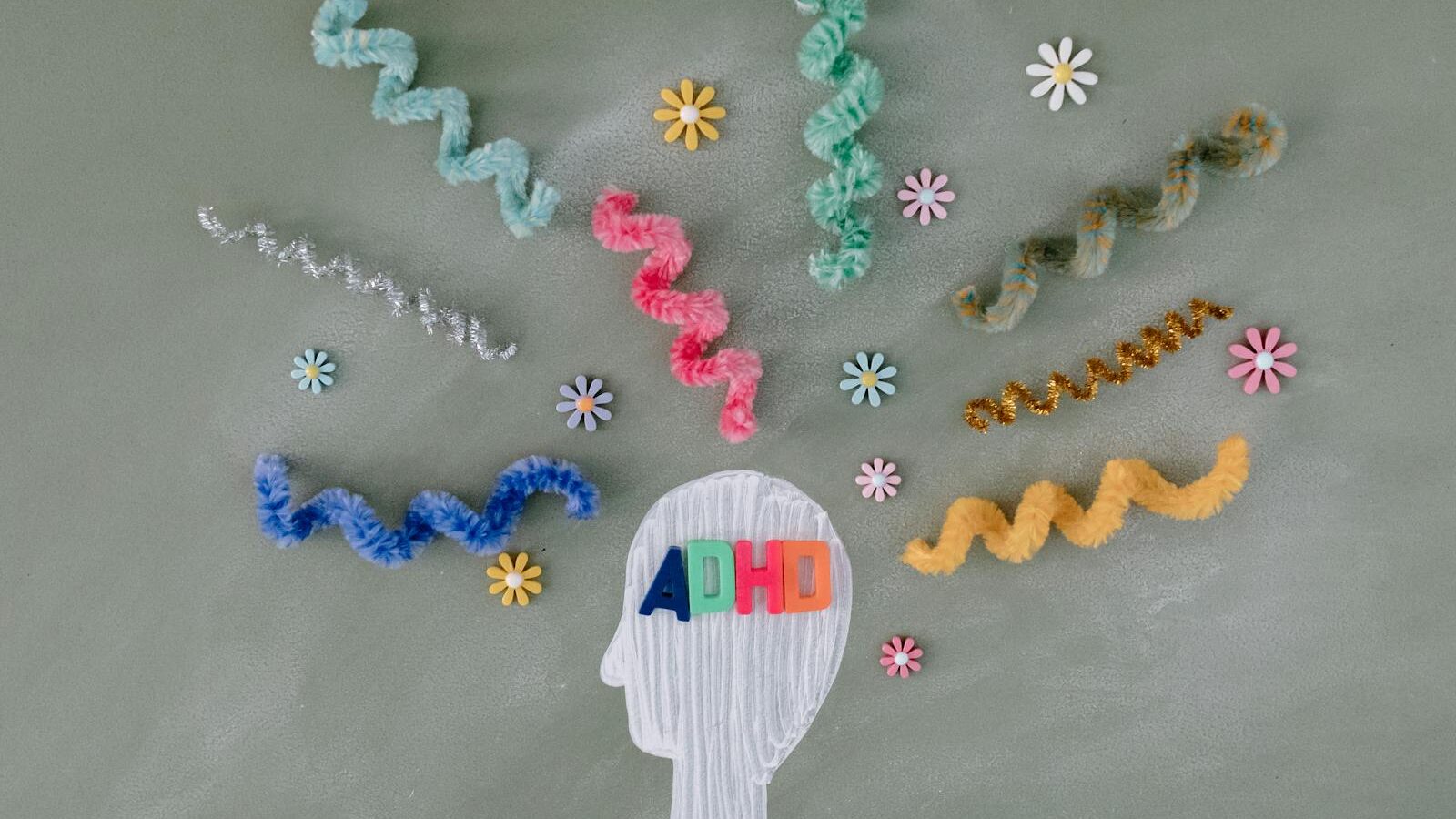 Creative illustration highlighting ADHD awareness with colorful brain imagery.